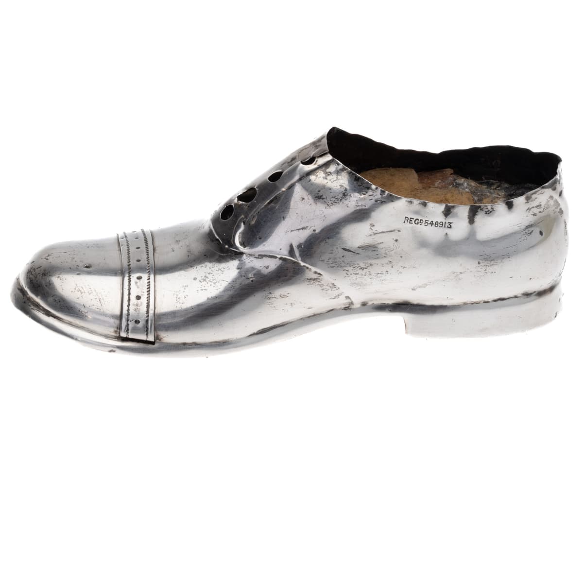 Side ViewAntique sterling silver pin cushion in the form of a gentleman’s shoe, hallmarked Chester c.1909, made by S. Blanckensee & Son Ltd with registered design number 548913.