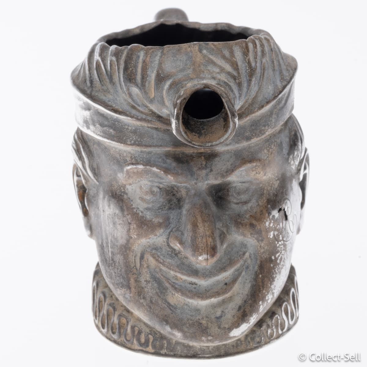 Sterling silver Mr. Punch cream jug front view, Richard Hodd & Son, London 1894